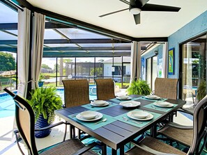 Outdoor dining - LAKEFRONT PROPERTY, LARGE HEATED POOL, newly renovated. Welcome to "Our Nest" (Port Richey)