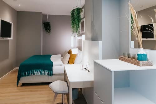 Blasky Family | Hypo-allergenic bedding, in-room safe, soundproofing, iron/ironing board