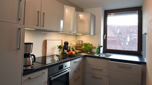 Apartment, 3 Bedrooms (Lilie) | Private kitchen | Coffee/tea maker, fridge, microwave, stovetop - Ferienwohnungen Hof Geiger am Bodensee (Uhldingen-Muehlhofen)