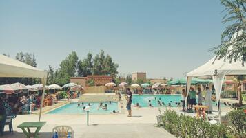 Seasonal outdoor pool, pool umbrellas, sun loungers