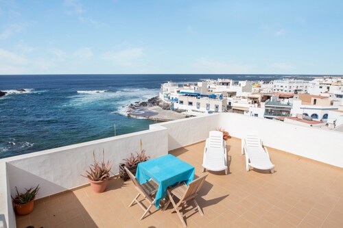 Zentrale Ferienwohnung "El Muellito" am Strand mit Dachterrasse und WLAN
