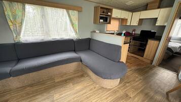 Chalet | Living area | 30-inch TV with digital channels