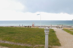 On the beach, sun-loungers