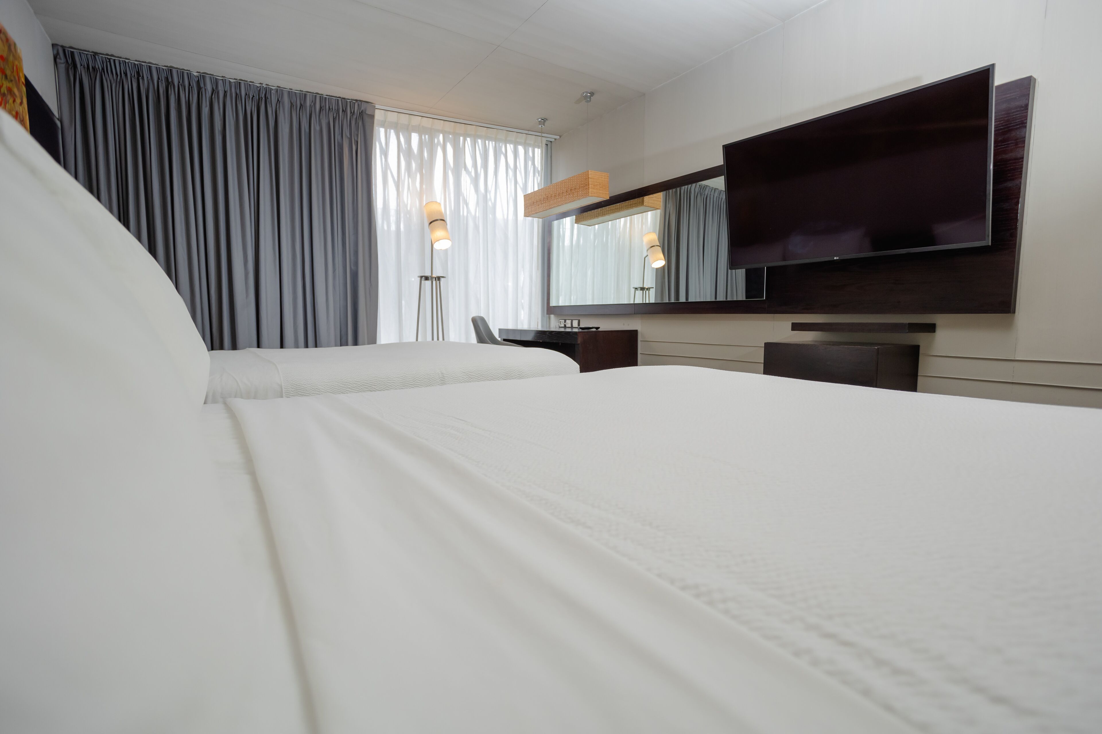 room, 2 queen beds | premium bedding, down duvets, select comfort beds, in-room safe