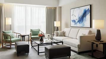 Executive Suite, 1 King Bed | Living room | 55-inch flat-screen TV with satellite channels, TV, pay movies