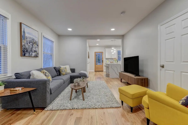 Dim the lights and get comfortable in the open concept living room.