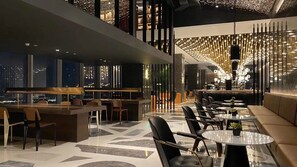 A modern interior with a bar area, seating, and a view of the city at night. - Twinkle Hotel (Hangzhou)