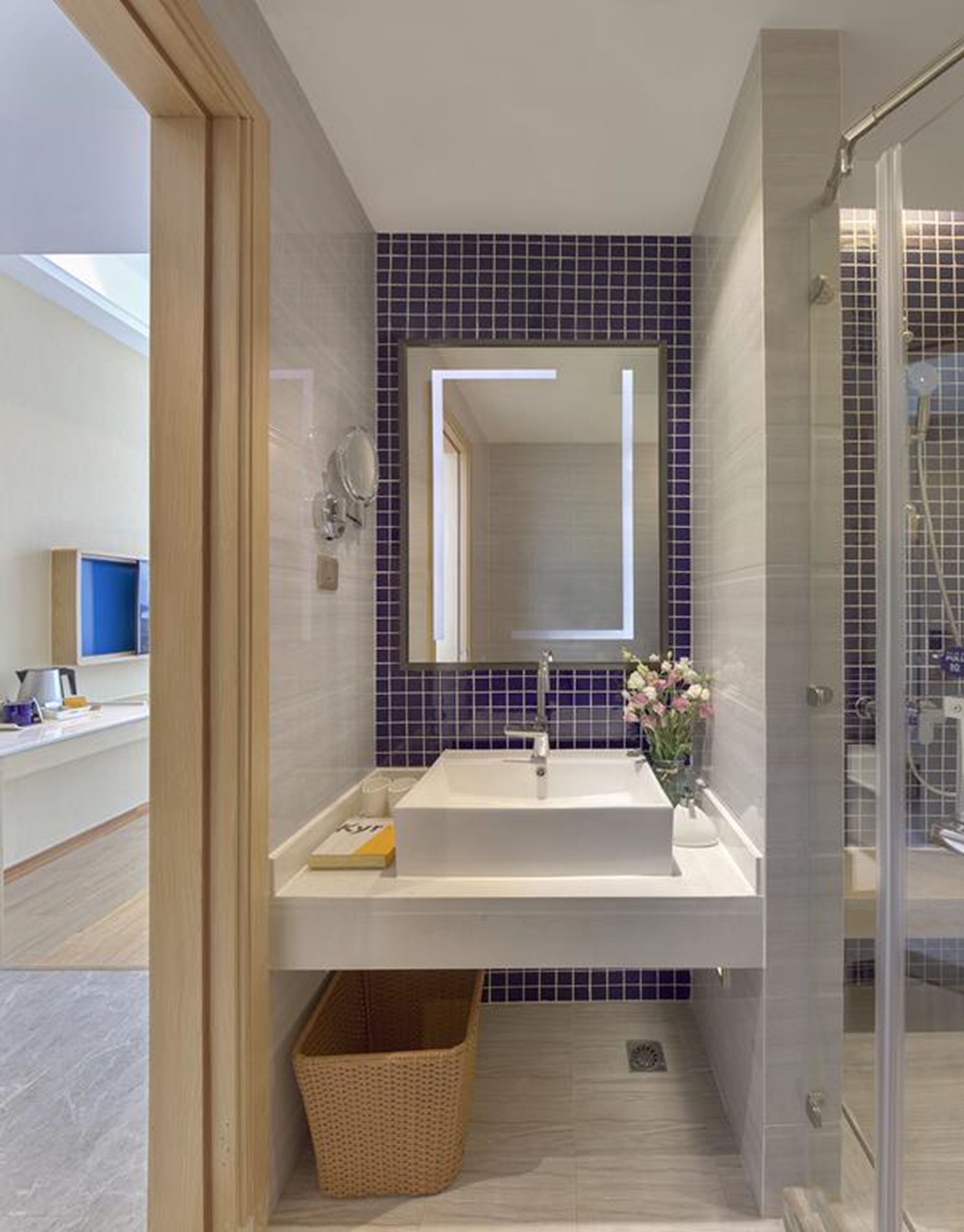 shower, hair dryer, slippers, towels