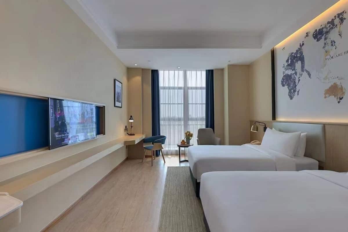 basic twin room | desk, laptop workspace, blackout curtains, soundproofing