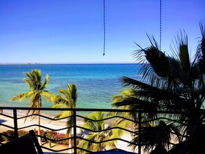 On the beach, sun-loungers, beach towels
