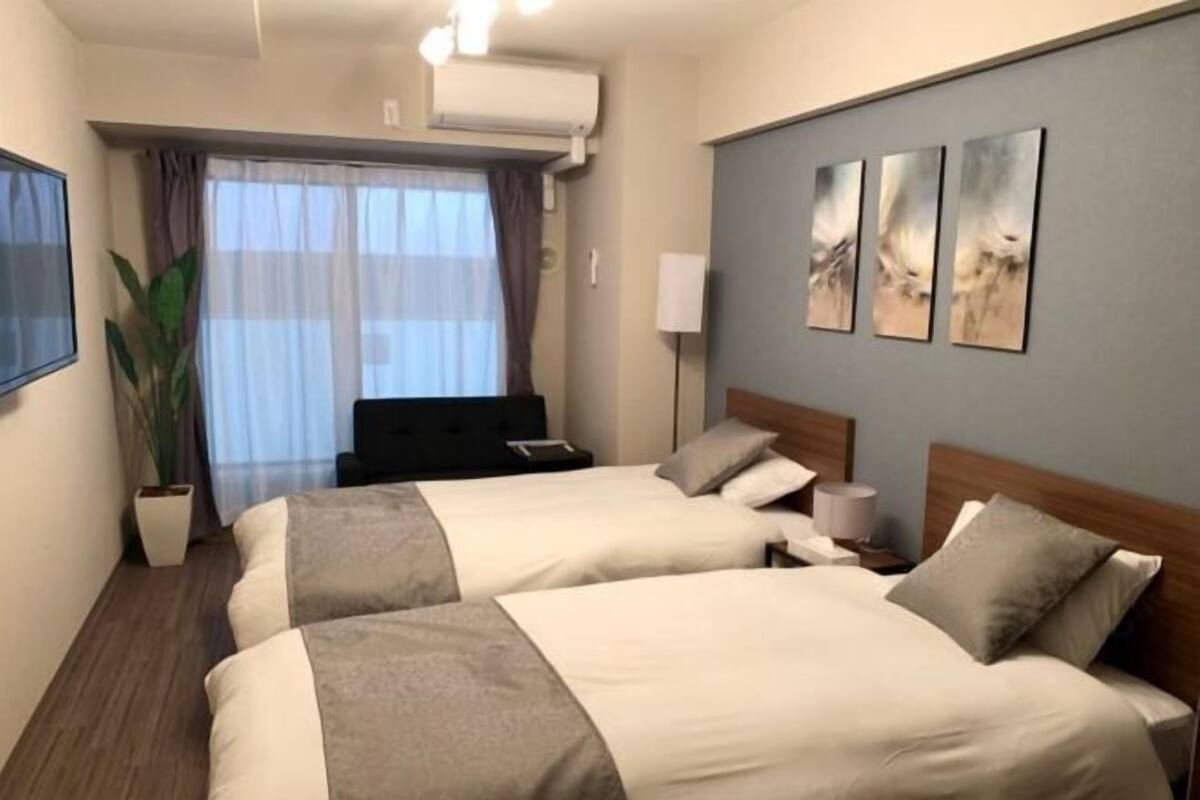 Blackout drapes, iron/ironing board, WiFi (free), bed sheets