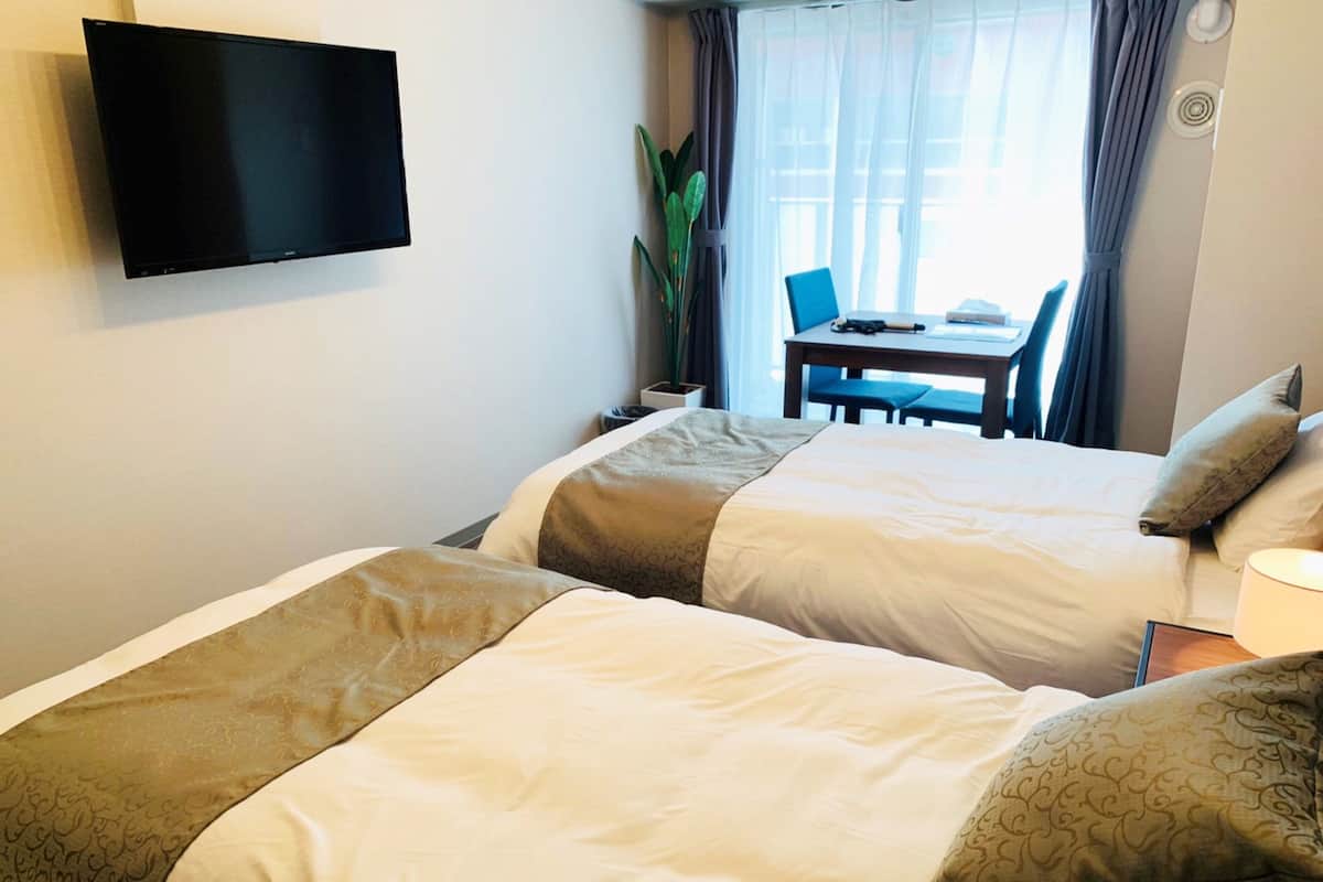 City Twin Room, Non Smoking | Blackout drapes, iron/ironing board, WiFi (free), bed sheets