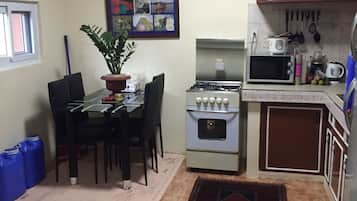 Fridge, microwave, oven, cookware/dishes/utensils