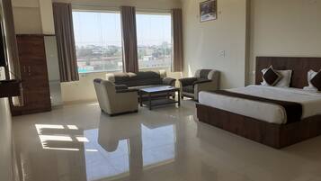 Individually furnished, desk, laptop workspace, rollaway beds