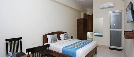 Individually furnished, desk, laptop workspace, rollaway beds