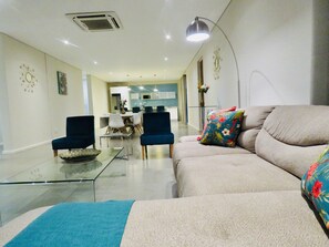 Executive Apartment, 3 Bedrooms | Living area | 55-inch LCD TV with satellite channels, TV