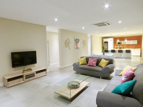 Executive Apartment, 3 Bedrooms | Living area | 55-inch LCD TV with satellite channels, TV