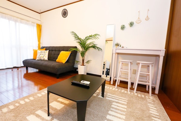 Apartment, 1 Bedroom | Living area | Flat-screen TV