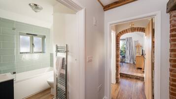 Combined shower/bathtub, hair dryer, towels, soap