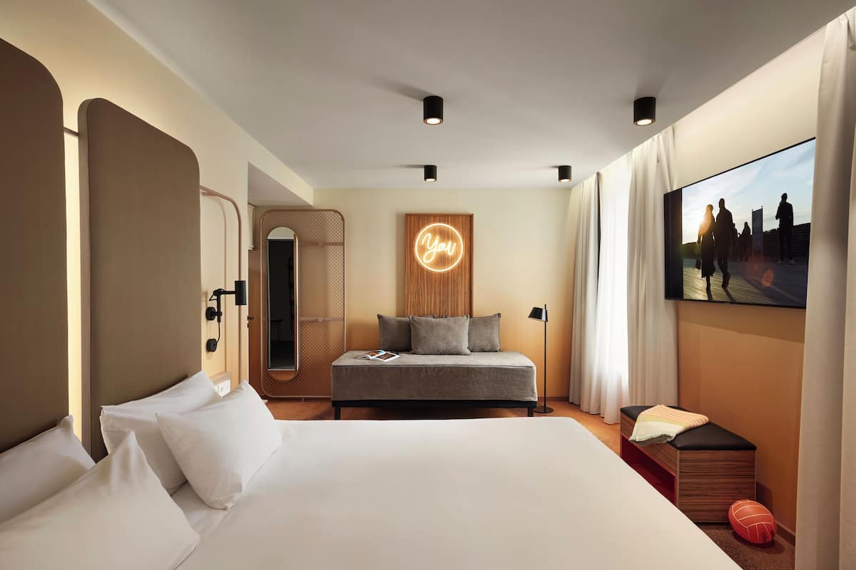 1 bedroom, premium bedding, laptop workspace, blackout curtains