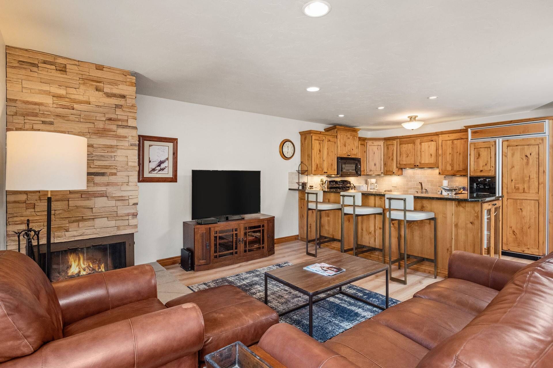 The living area is a perfect spot to relax in the evenings in front of the wood burning fireplace while sharing the days adventures.