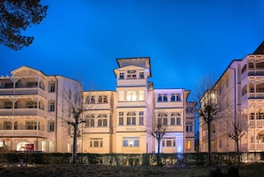 A multi-story hotel with a classic European architectural style, featuring balconies and large windows. - Double room with balcony - Hotel Villa Belvedere (Binz)
