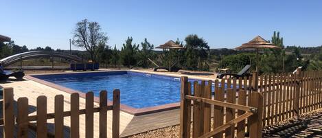 Outdoor pool, pool umbrellas, pool loungers