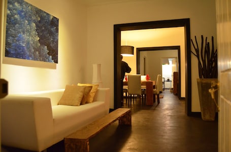 Deluxe Double Room | Living area | Flat-screen TV