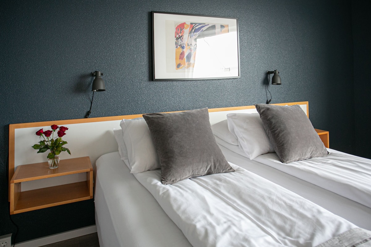 standard triple room, private bathroom | blackout curtains, iron/ironing board, free cots/infant beds, free wifi