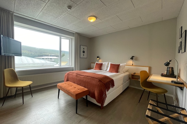 Blackout curtains, iron/ironing board, free WiFi, bed sheets