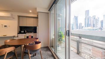 Apartment (1 Bedroom) | Private kitchen | Fridge, microwave, oven, stovetop