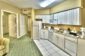 Fridge, microwave, oven, dining tables