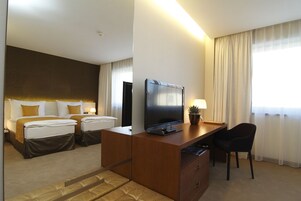 Standard Double or Twin Room | Minibar, desk, laptop workspace, blackout drapes