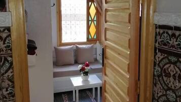 Shower, rainfall showerhead, hair dryer, towels