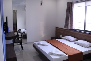 Iron/ironing board, bed sheets - Hotel Sai Gold Inn (Rahata)