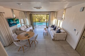 Premium Villa, Private Pool (Villa Orion) | Living area | 32-inch flat-screen TV with satellite channels, Smart TV - Stargaze Villas (Skopelos)