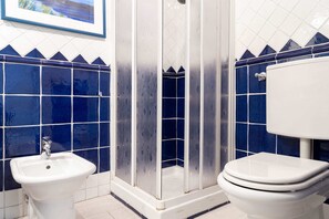 Baignoire, sèche-cheveux