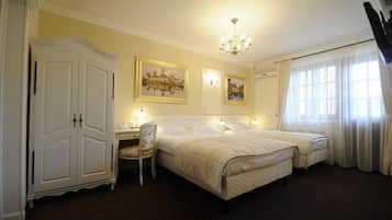 Premium bedding, down duvets, memory-foam beds, in-room safe