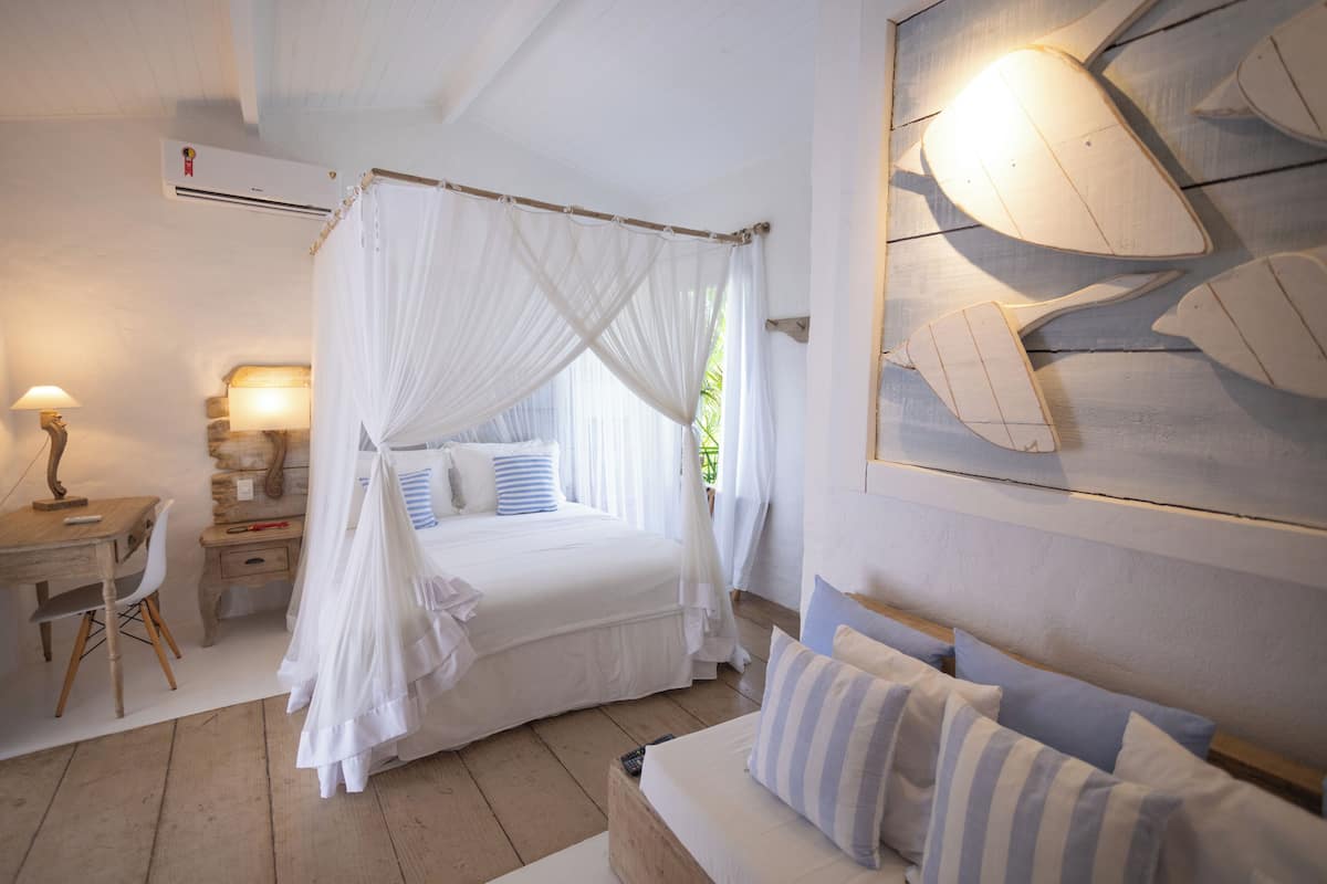 Suíte superior (Quadrado) | Roupas de cama premium, frigobar, cofres nos quartos