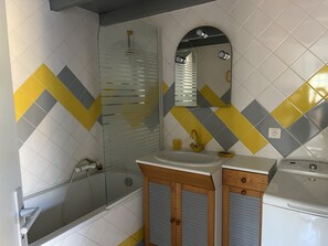 Combined shower/tub, hair dryer