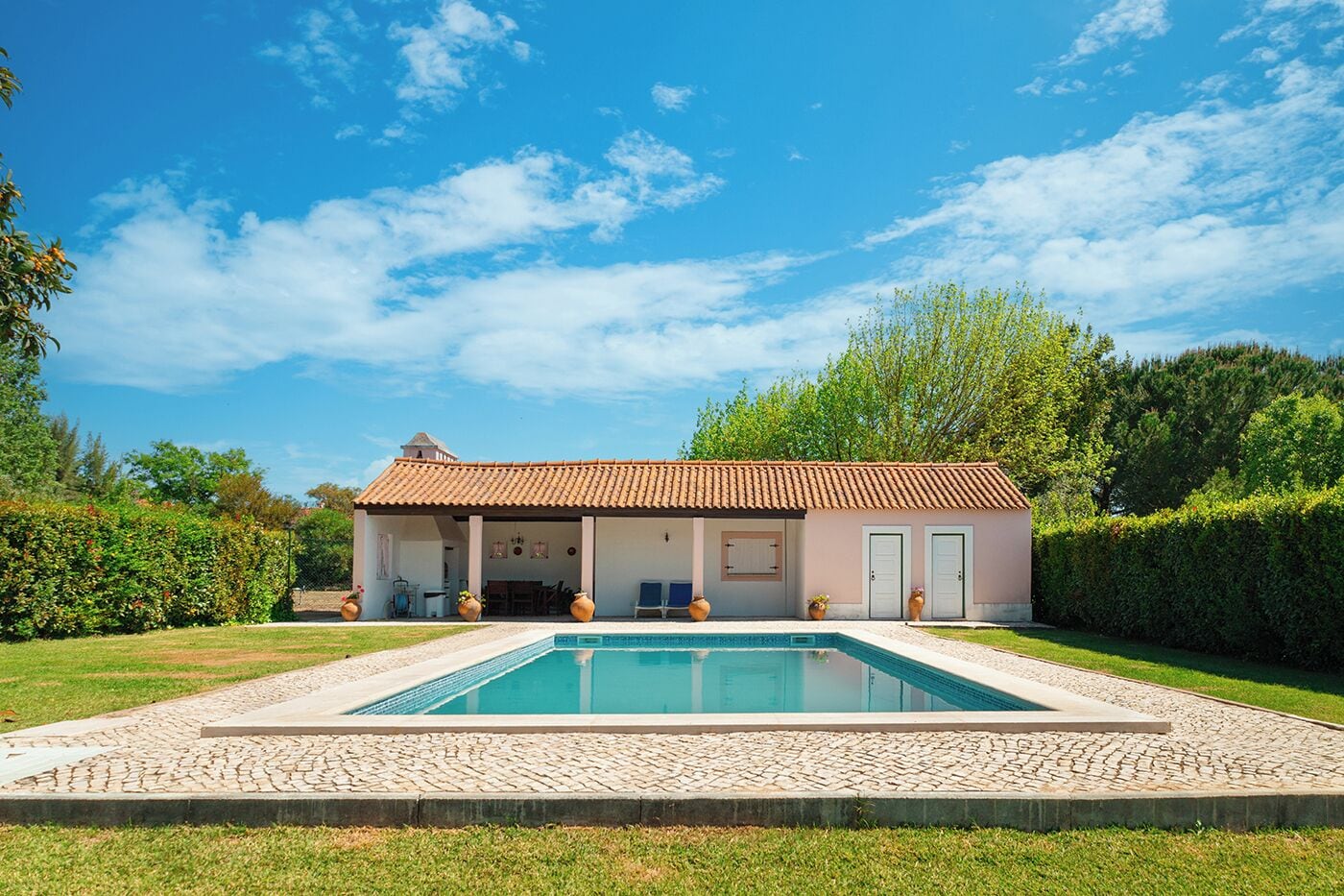 Seasonal outdoor pool, open 7:30 AM to 10:00 PM, sun loungers