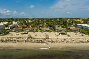 On the beach, sun-loungers, beach towels