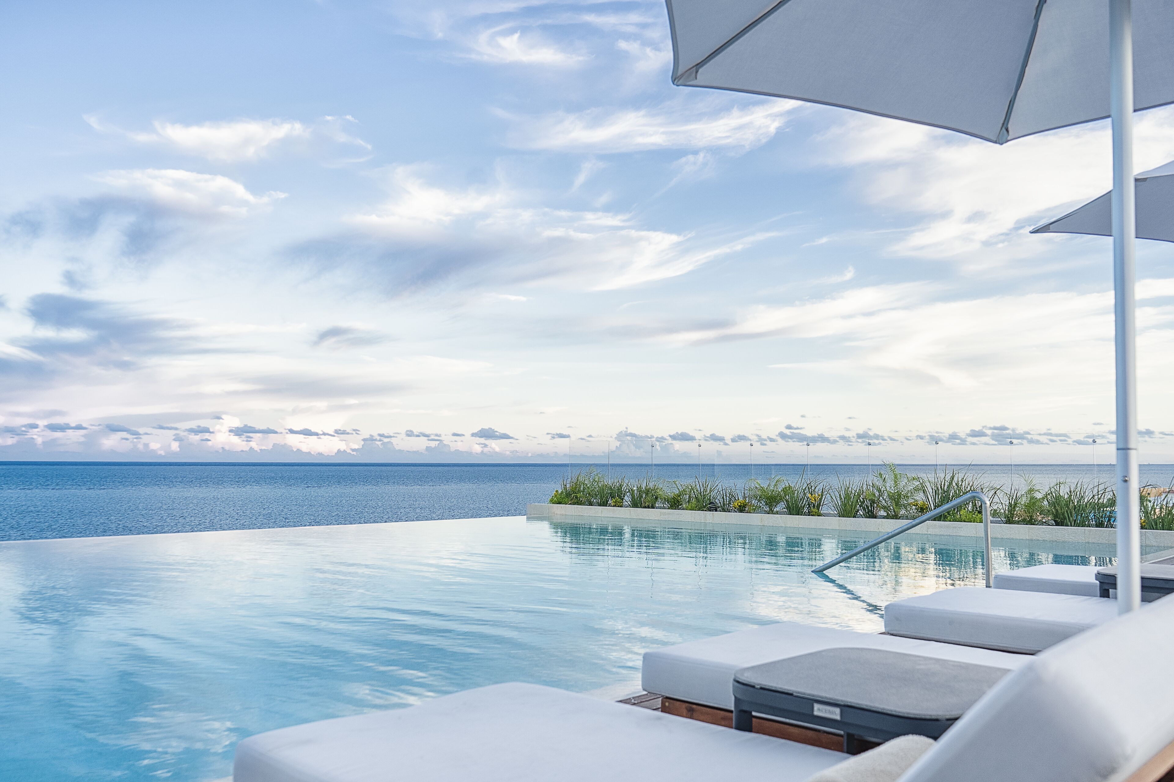 2 outdoor pools, open 7:00 AM to 7:00 PM, pool umbrellas, sun loungers