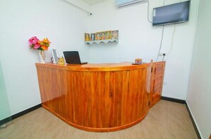 Welcome to our reception area, where guests can check in and enjoy the artwork on display.