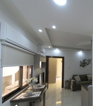 Apartment | Living area | 30-inch TV with digital channels