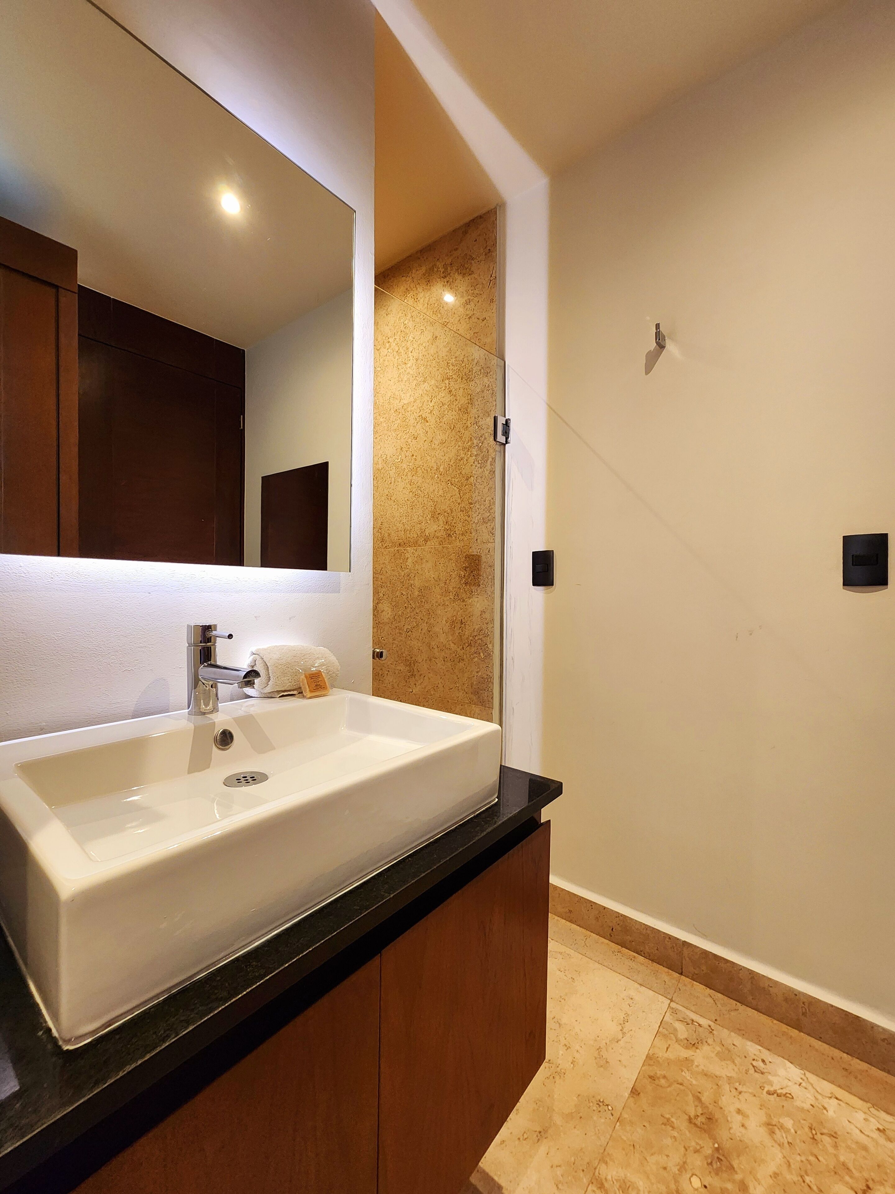 superior studio suite | bathroom | shower, designer toiletries, hair dryer, heated floors