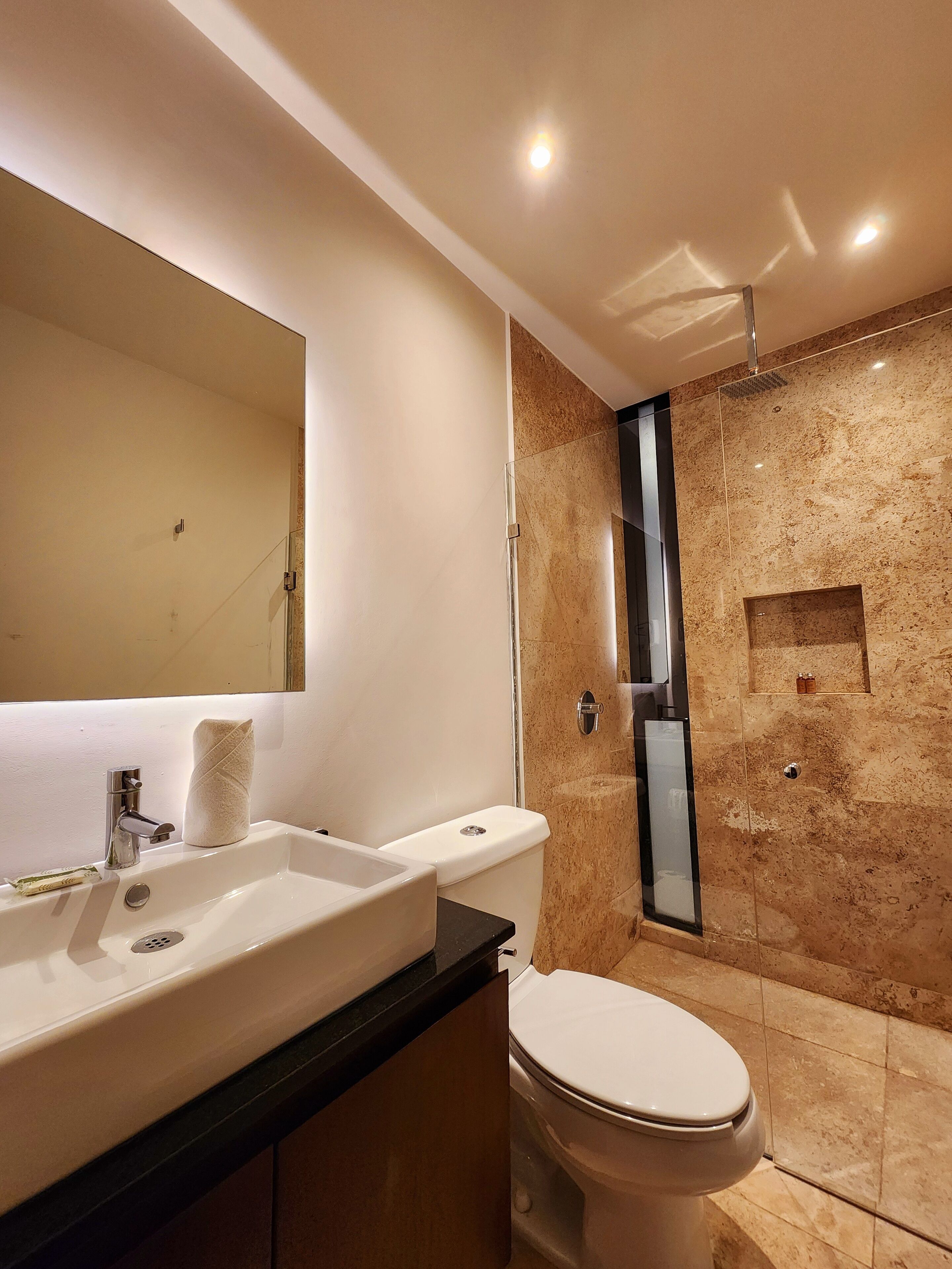 deluxe studio | bathroom | shower, designer toiletries, hair dryer, heated floors