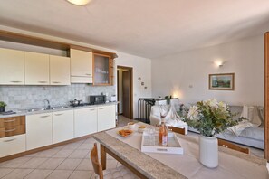 Interior - Michela 4  by Theater Home, with private garden and lake view (Tignale)