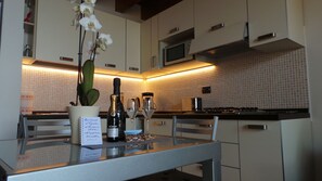 Fridge, microwave, dishwasher, coffee/tea maker