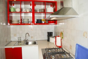 Fridge, coffee/tea maker, electric kettle, toaster